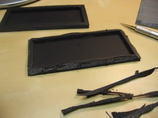 Trimming the edges down.